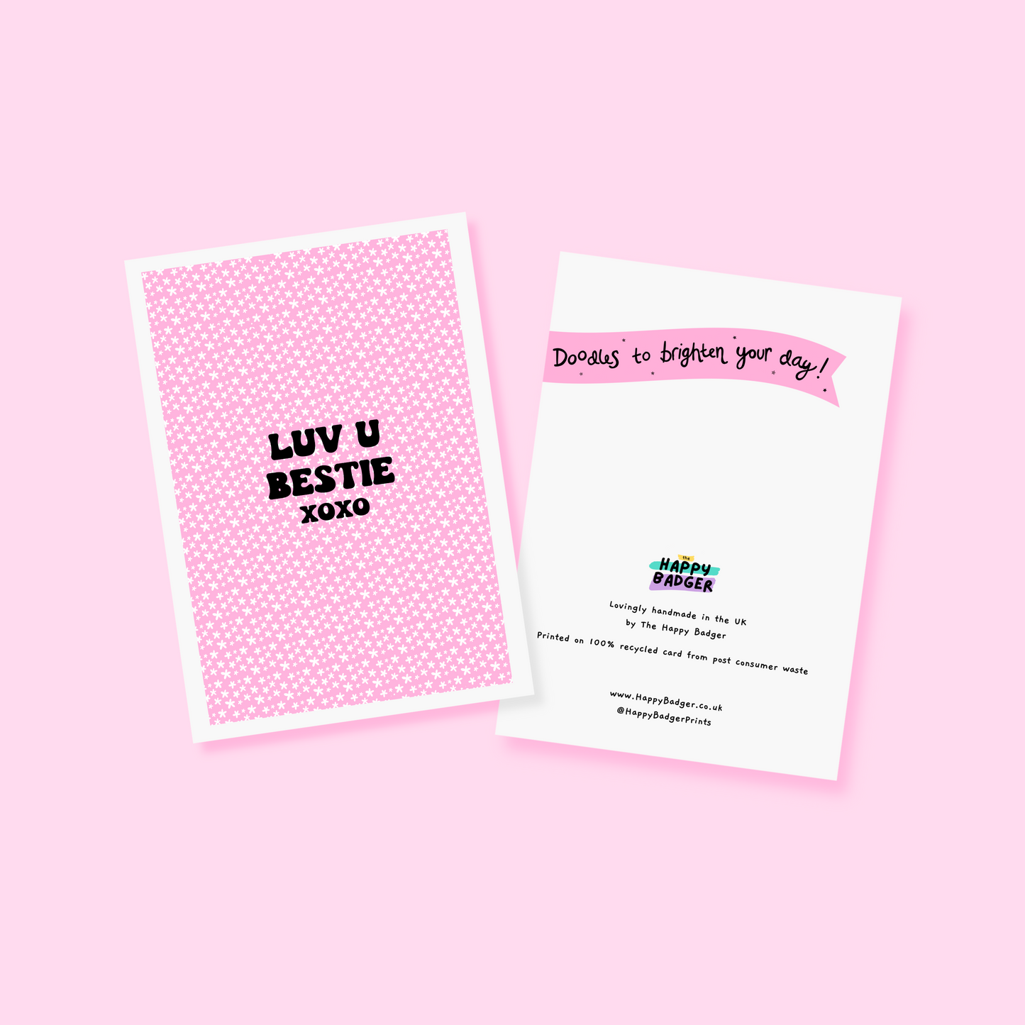 A pink greetings card, with the message 'Luv u bestie xoxo' on the front.