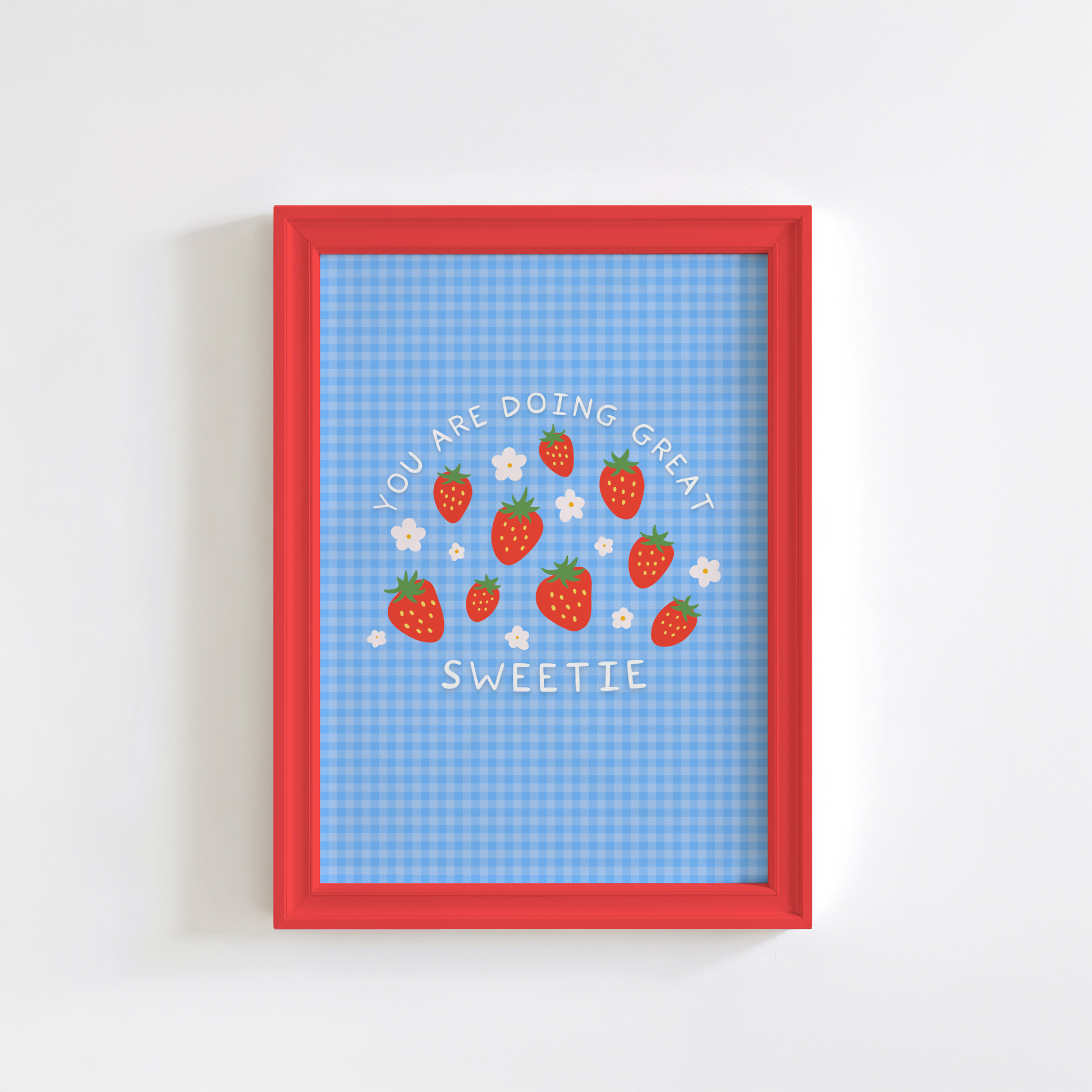 A blue gingham print, with white text that reads 'you are doing great sweetie' wrapped around strawberry and daisy illustrations in the centre.