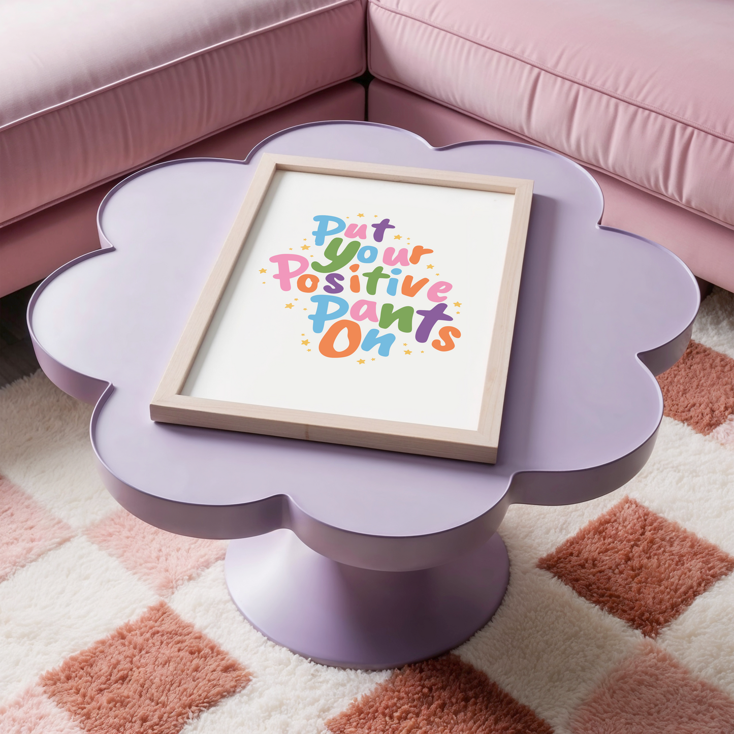A colourful quote print that says 'put your positive pants on'.
