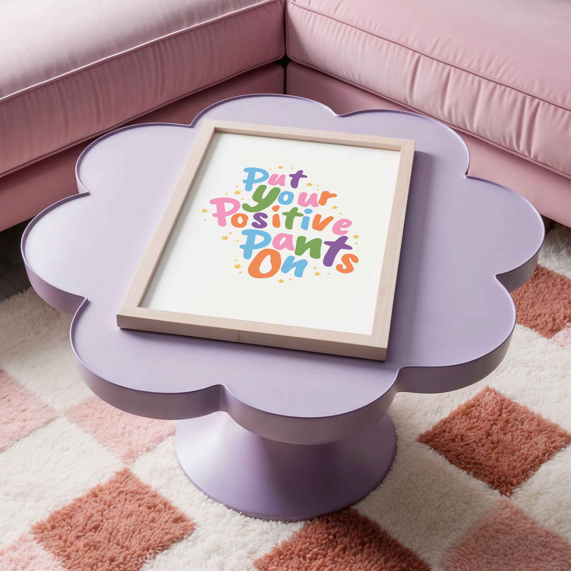A colourful quote print that says 'put your positive pants on'.