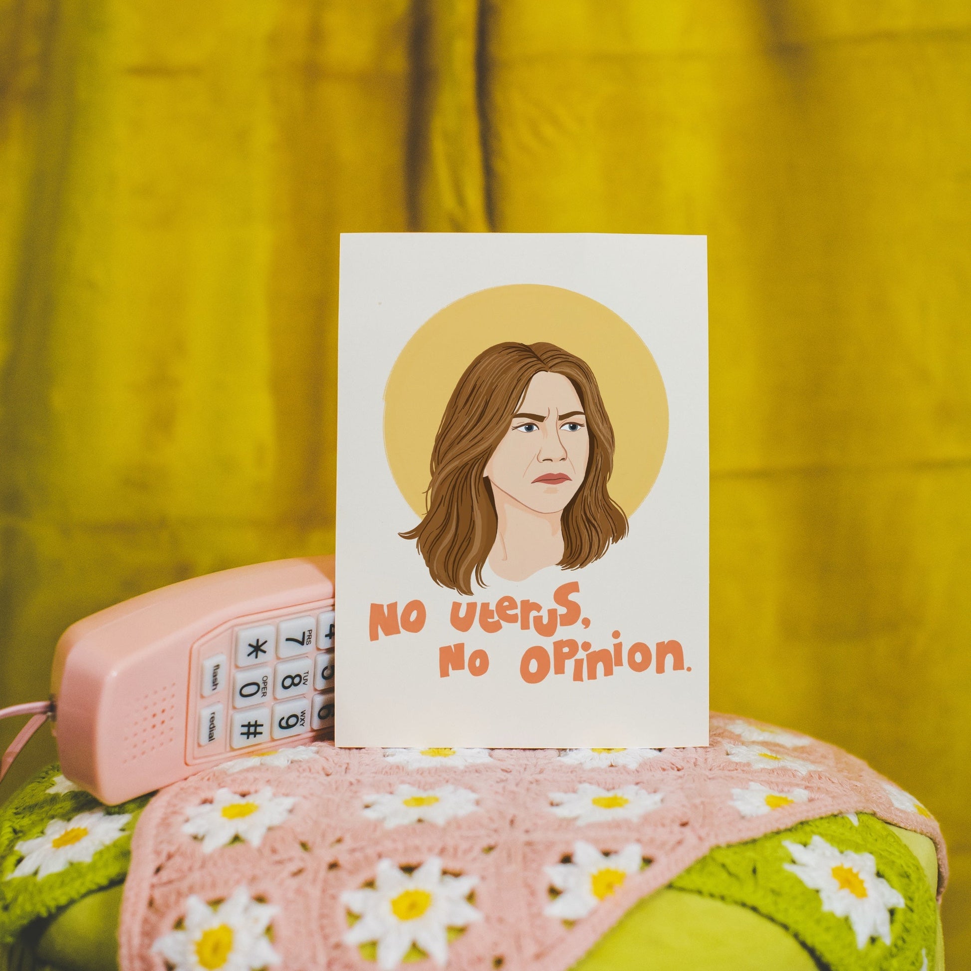 An illustrated portrait print of Rachel Green from friends, with a funny quote that reads 'no uterus, no opinion'.