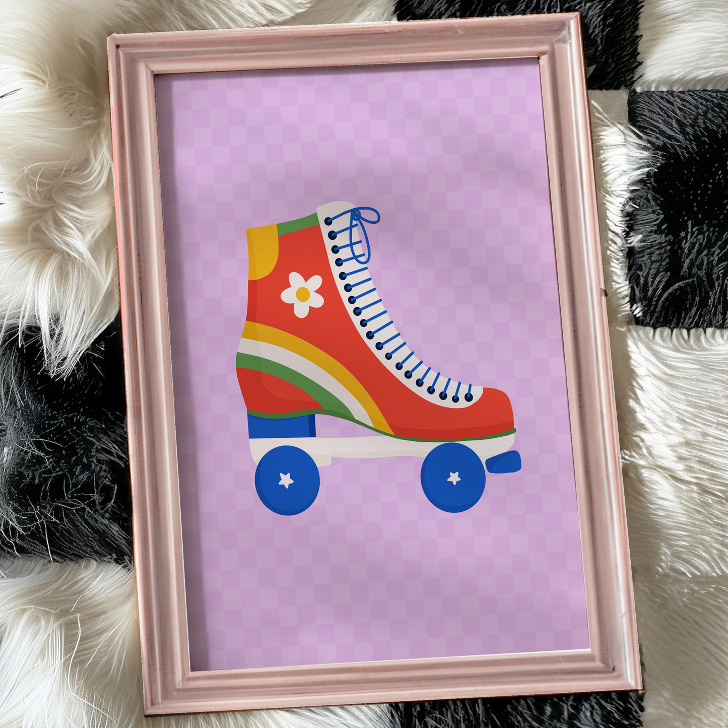 A bright purple print with an illustration of roller skates in bright vivid retro colours in the centre.