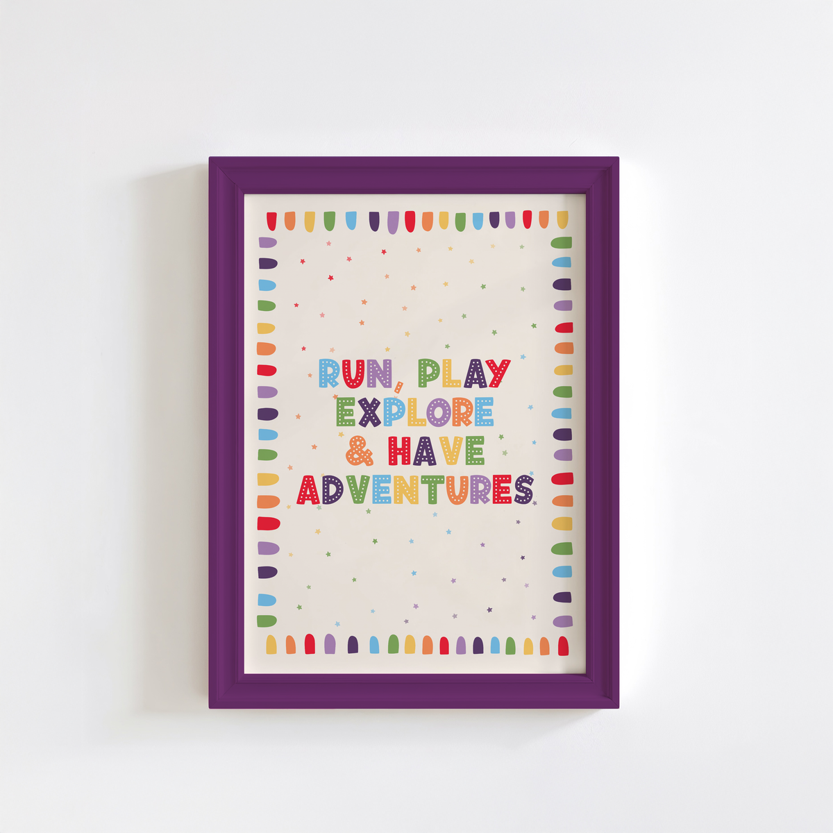An art print with colourful text reading 'RUN, PLAY, EXPLORE & HAVE ADVENTURES'.