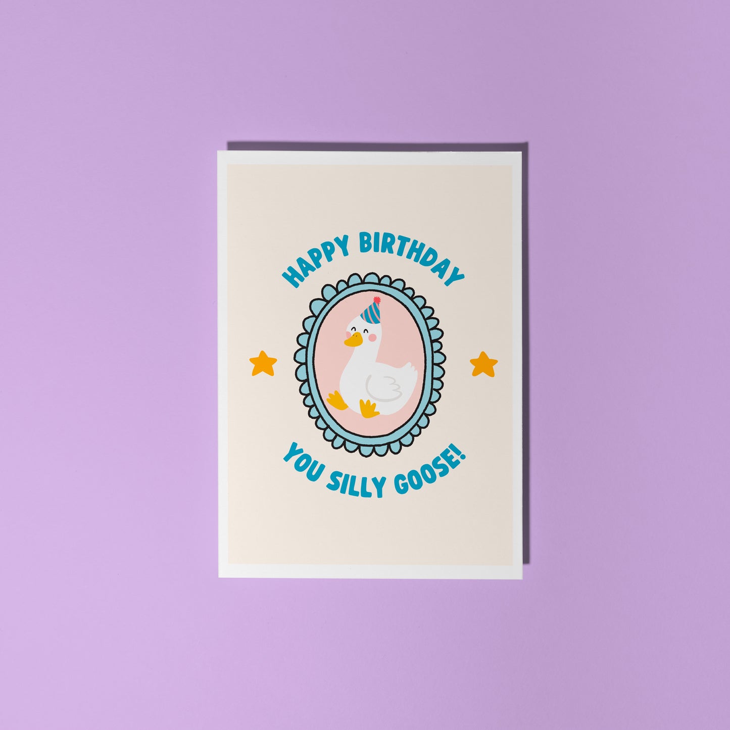 A birthday card with an illustration of a goose in a party hat, with text around it saying 'happy birthday you silly goose'.