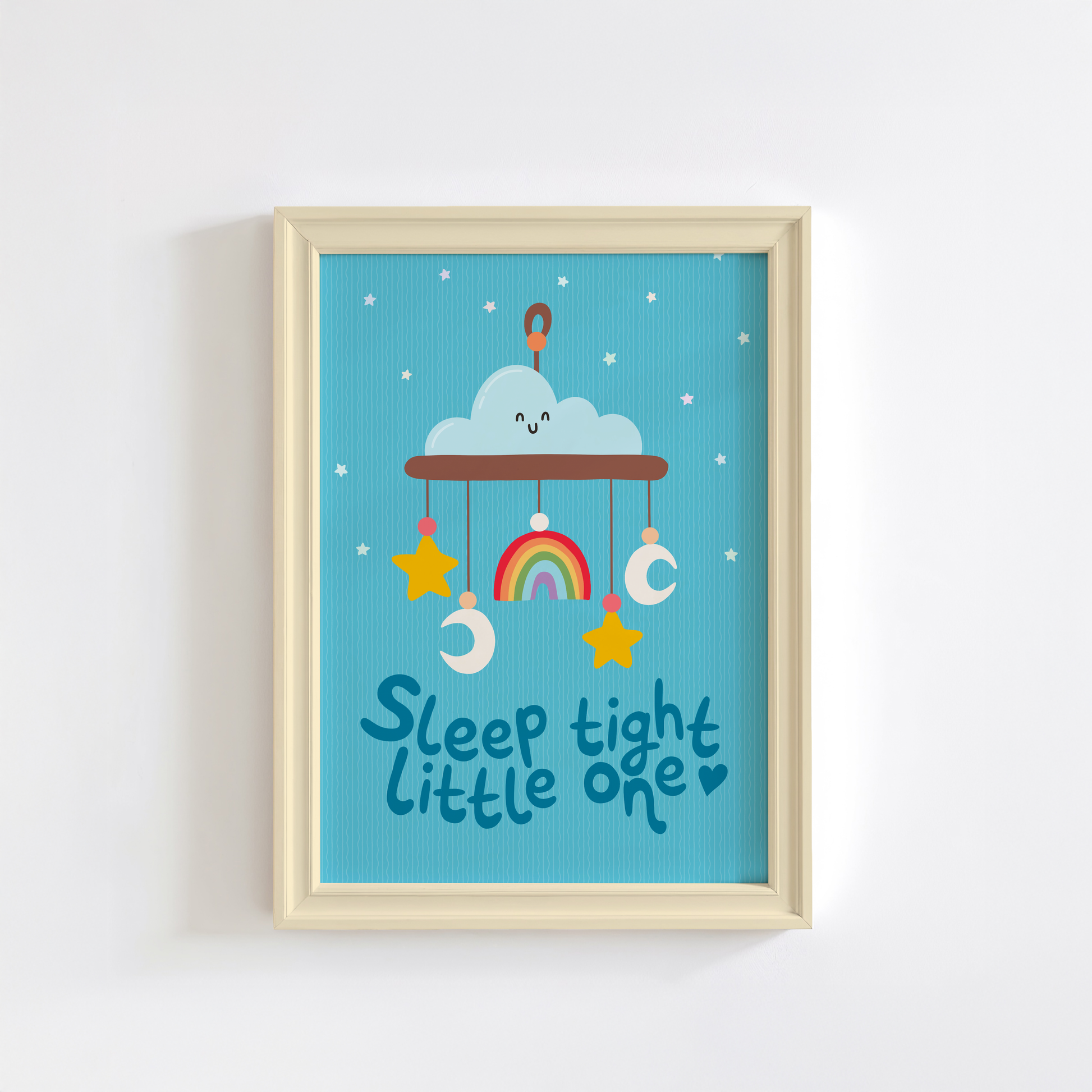 A blue print with an illustration of a children's mobile, and the words 'sleep tight little one' underneath.