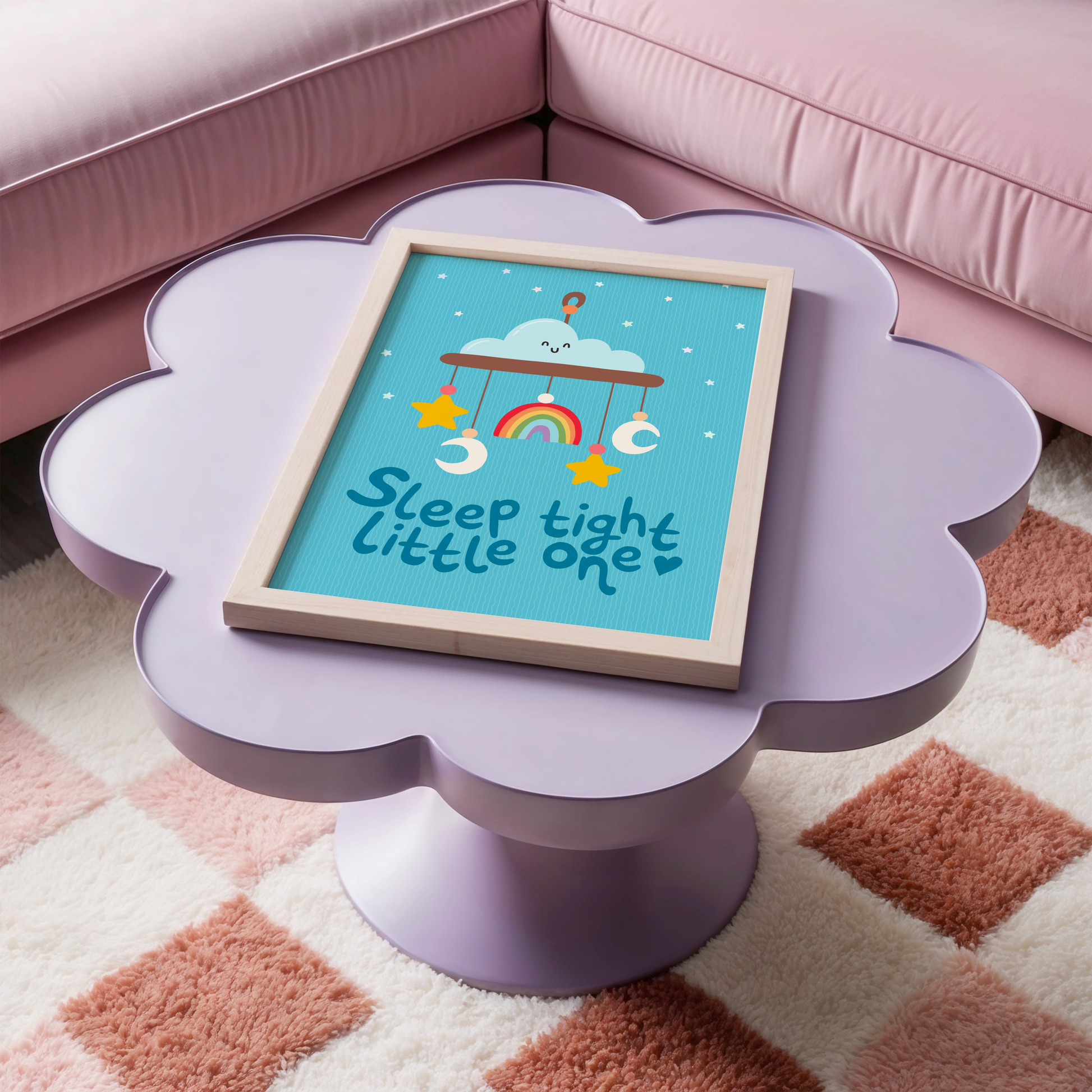 A blue print with an illustration of a children's mobile, and the words 'sleep tight little one' underneath.