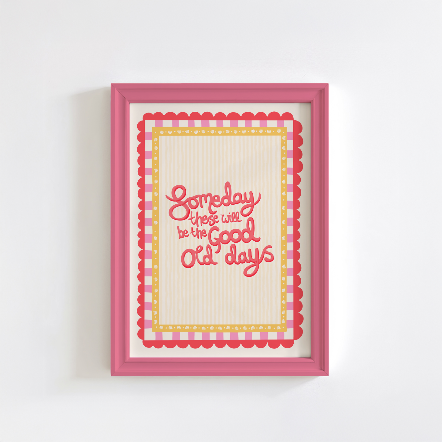 Framed print with 'Someday these will be the good old days' text on a creamy yellow background.