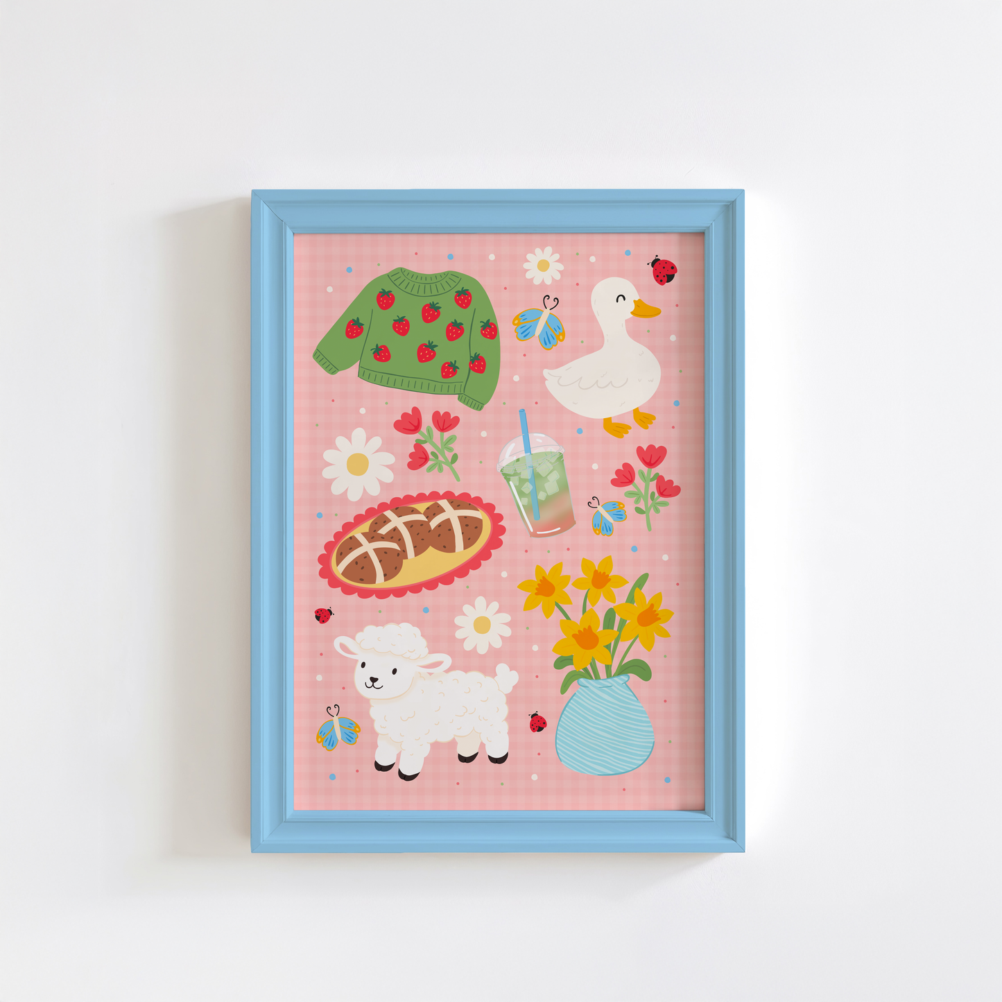 A pink gingham print, with spring themed illustrations - hot cross bunds, iced matcha latte, a duck, a lamb, daffodils and a strawberry print jumper.