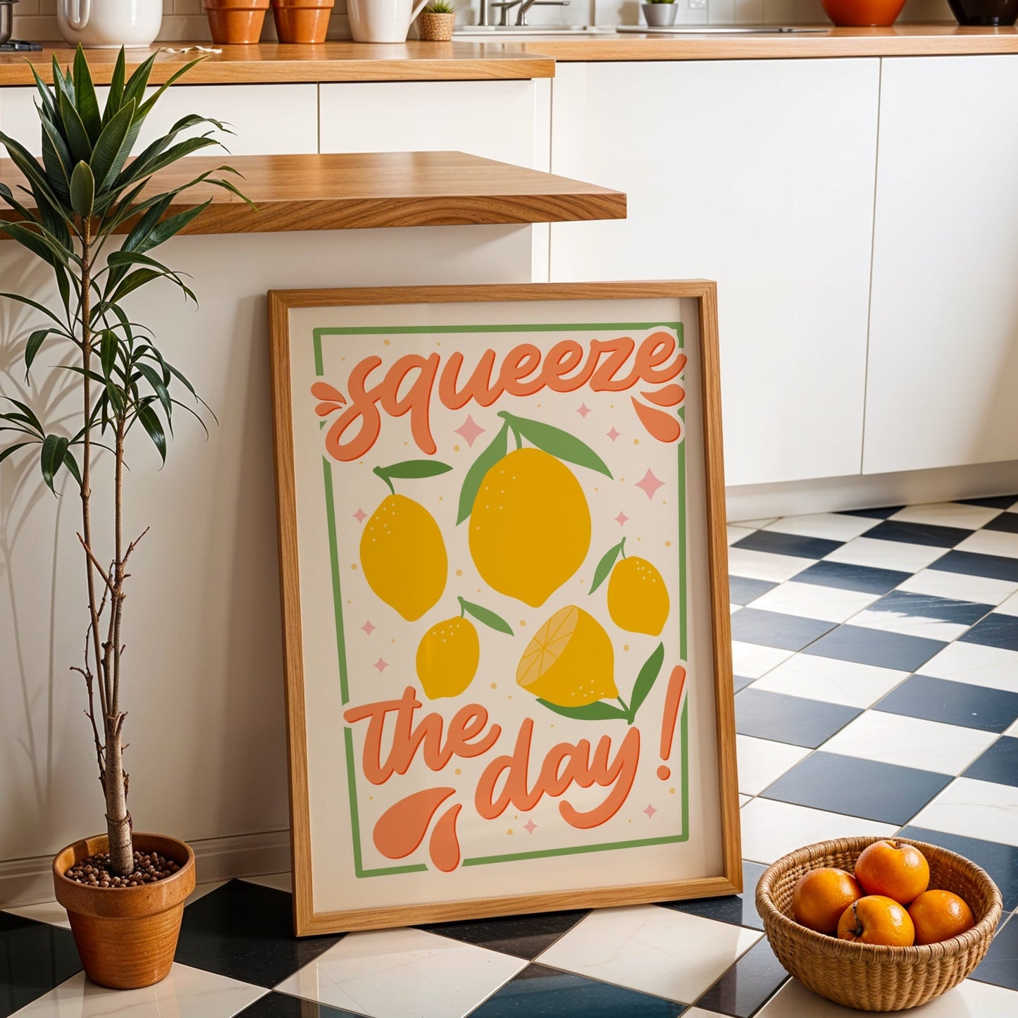 An art print with the text 'squeeze the day!' surrounded by illustrations of lemons and leaves in shades of yellow, green, and orange.