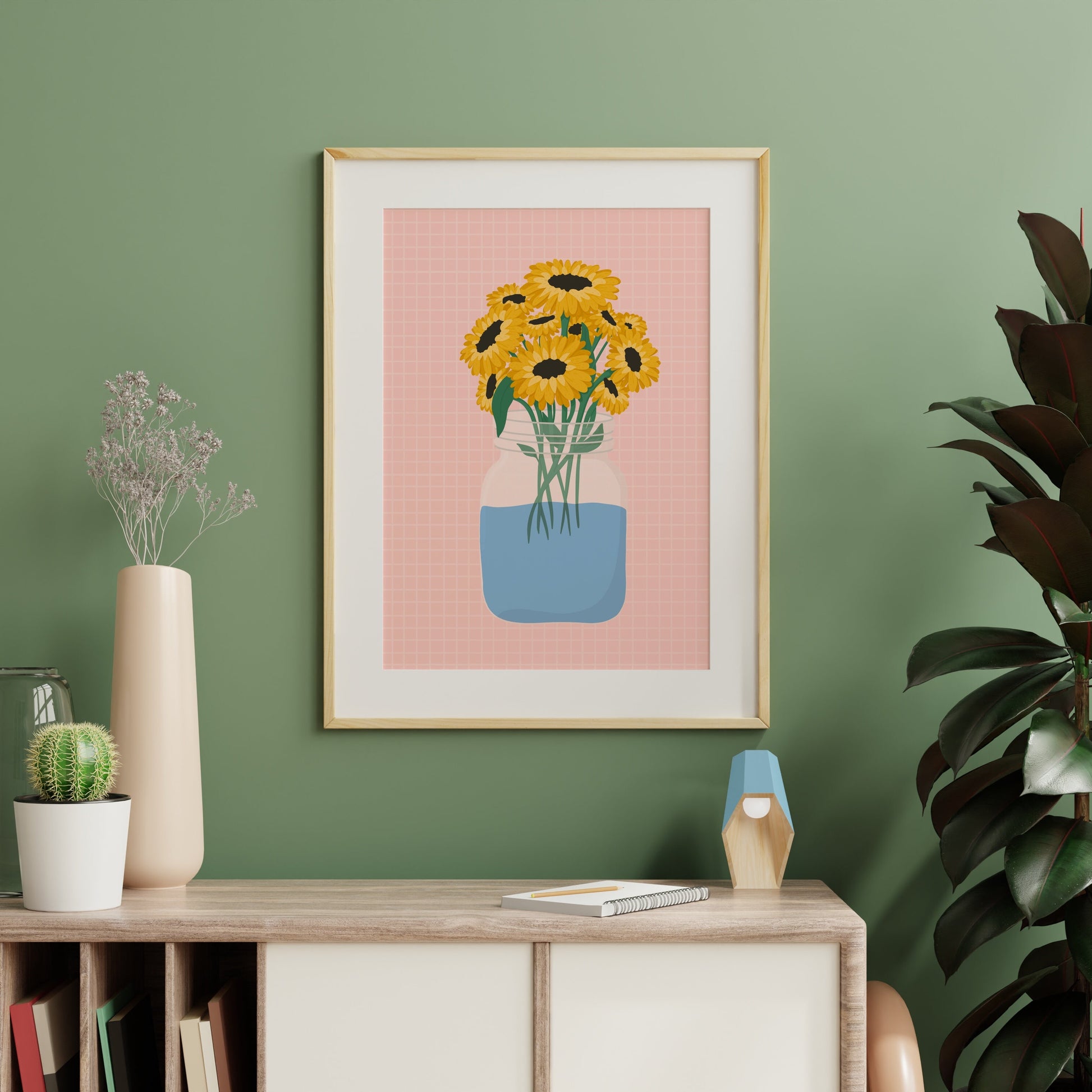 A jar of yellow sunflowers, on a pink patterned background.