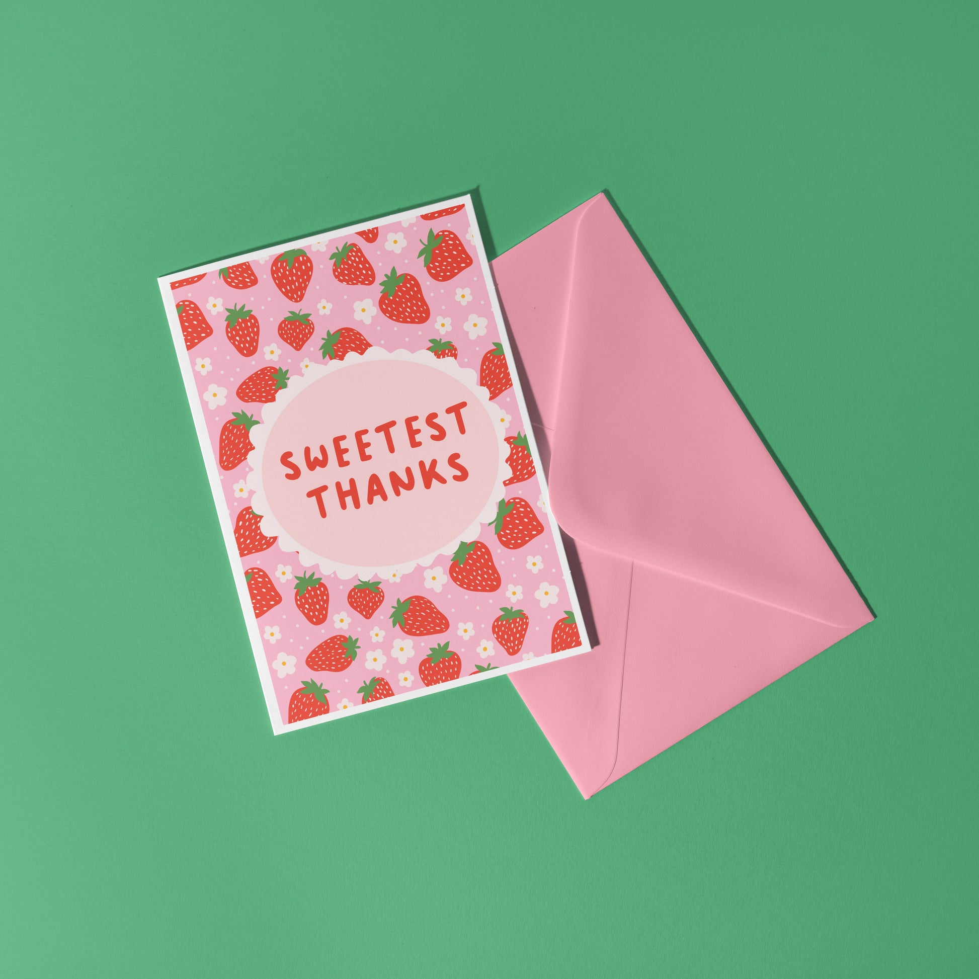 Thank you card with a strawberry pattern and the words 'Sweetest Thanks'.