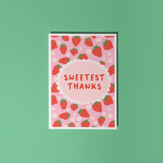 Thank you card with a strawberry pattern and the words 'Sweetest Thanks'.