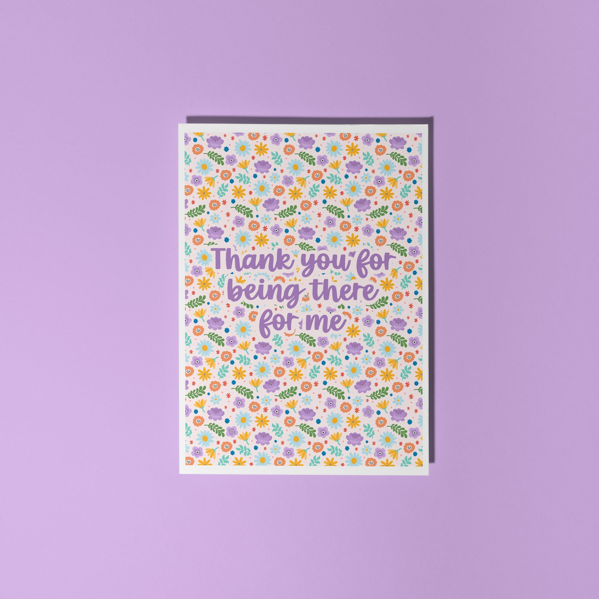 A colourful floral card with hand lettered text that reads 'thank you for being there for me'.