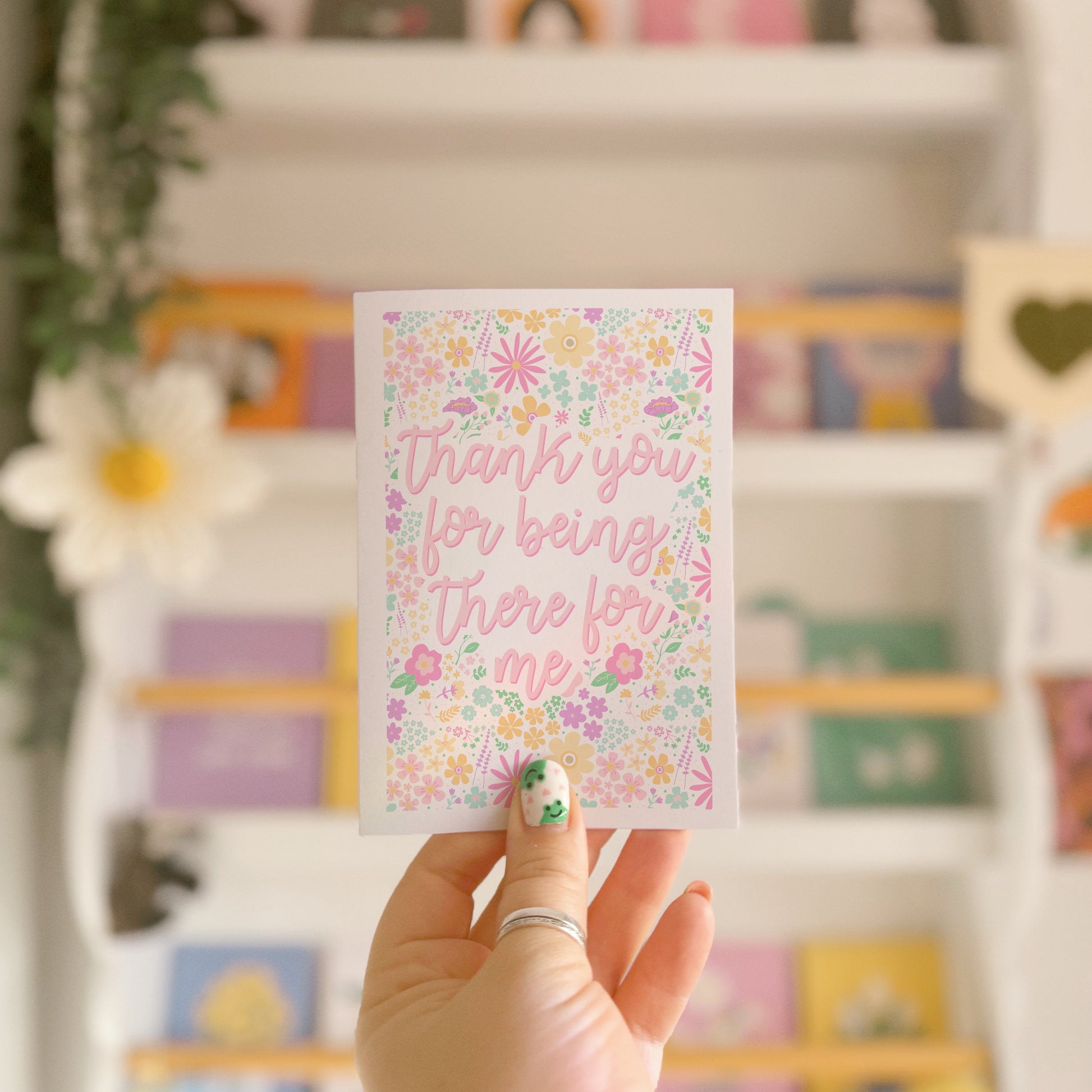 A floral patterned card, that has text centrally reading 'thank you for being there for me'.