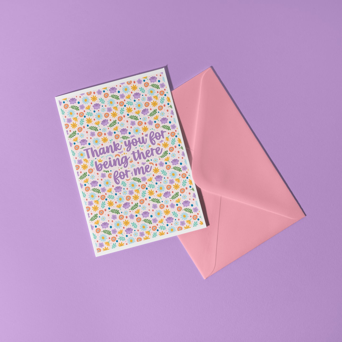 A colourful floral card with hand lettered text that reads 'thank you for being there for me'.