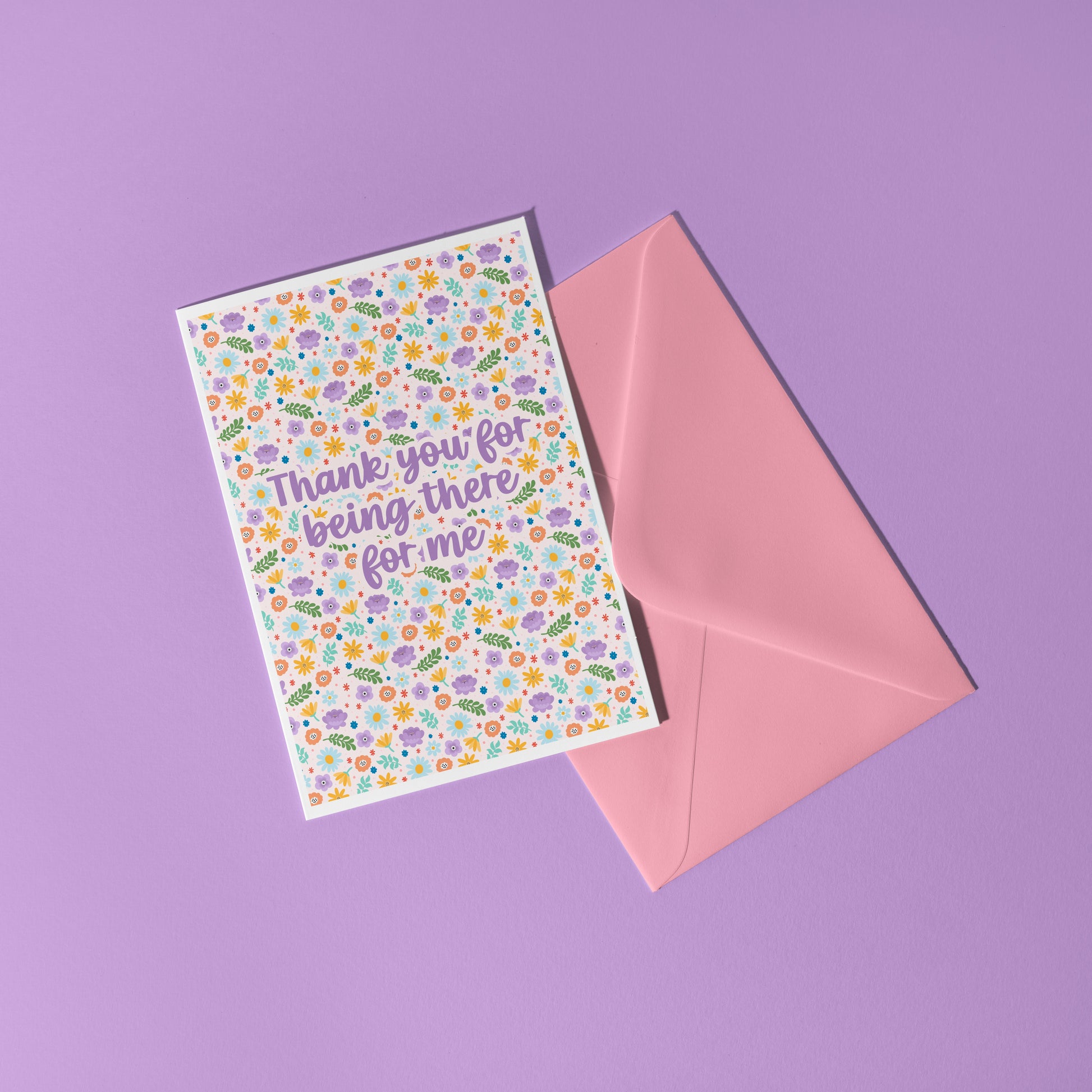 A colourful floral card with hand lettered text that reads 'thank you for being there for me'.