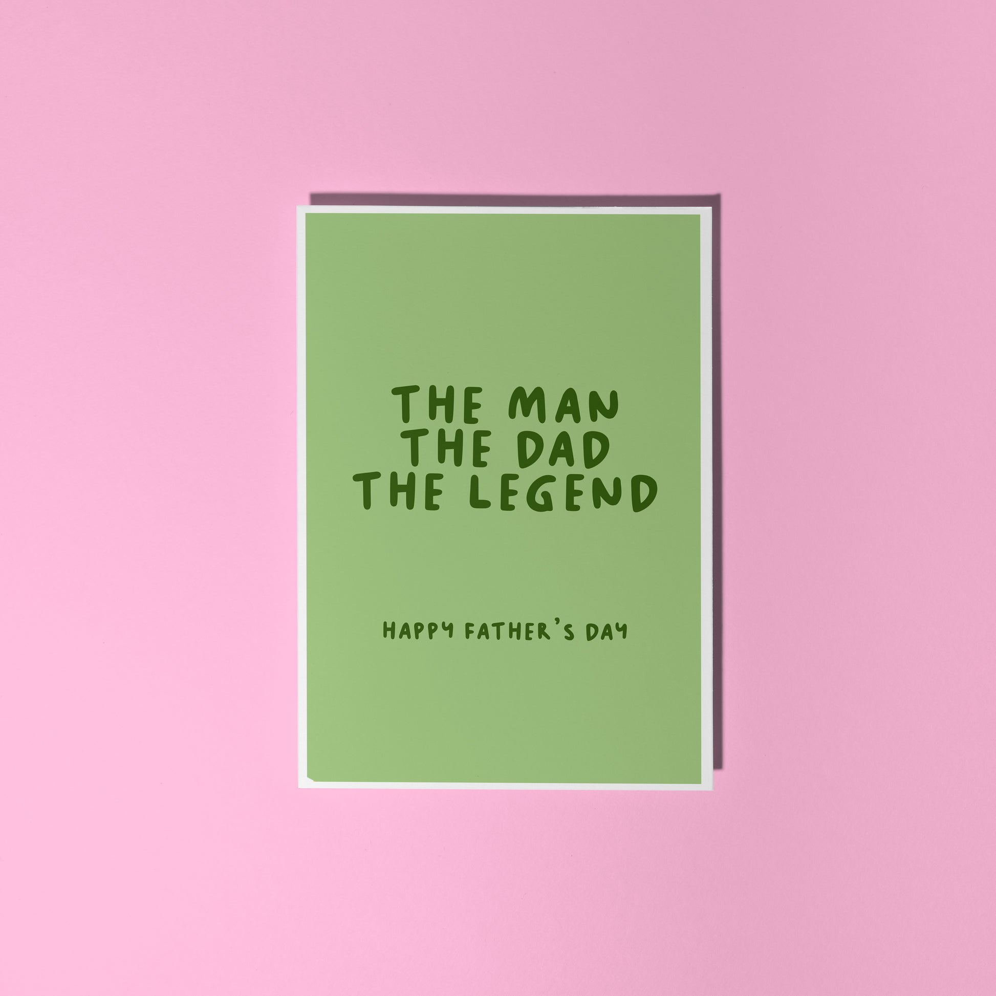 A green card with text that reads 'the man the dad the legend. Happy Fathers Day'.