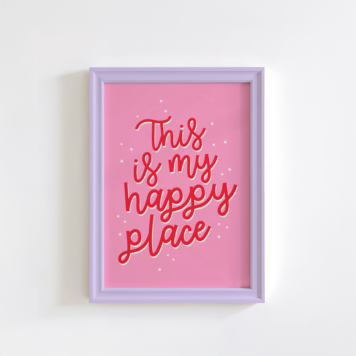 A bold pink print with a quote in red that reads 'this is my happy place'.