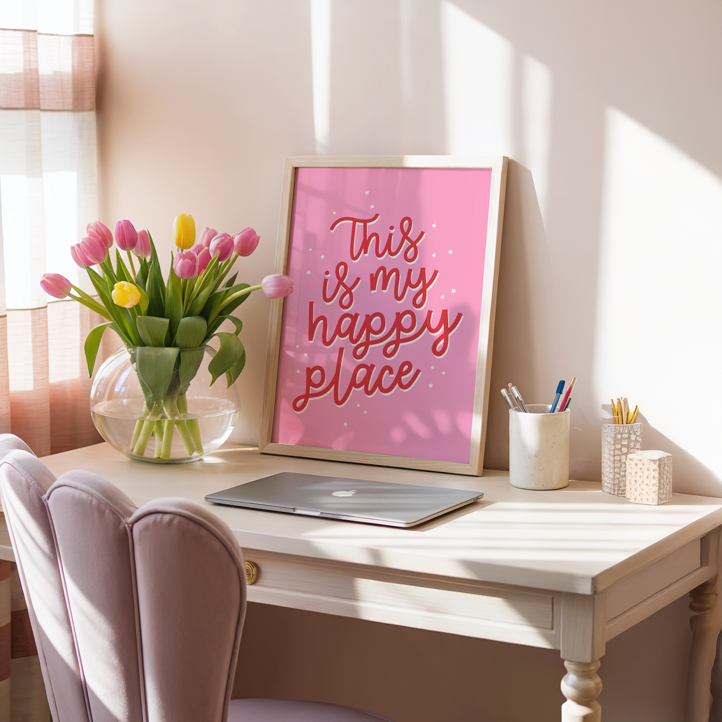 A bold pink print with a quote in red that reads 'this is my happy place'.