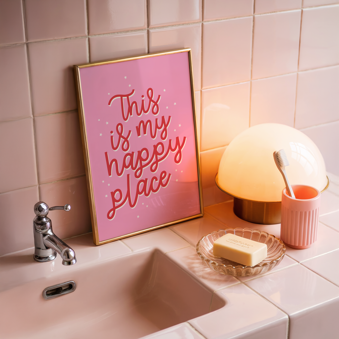 A bold pink print with a quote in red that reads 'this is my happy place'.