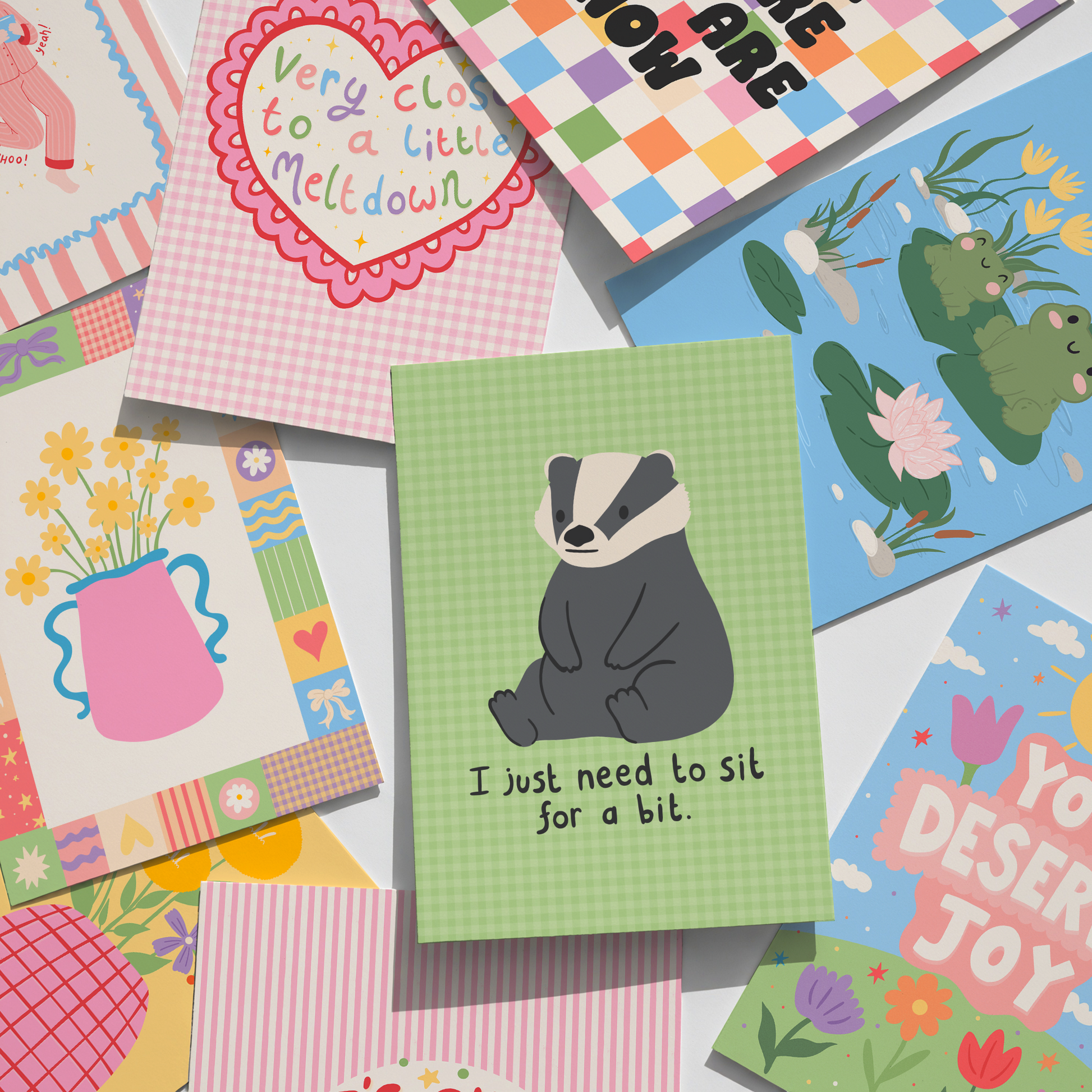 Collection of colourful prints with various designs and text.