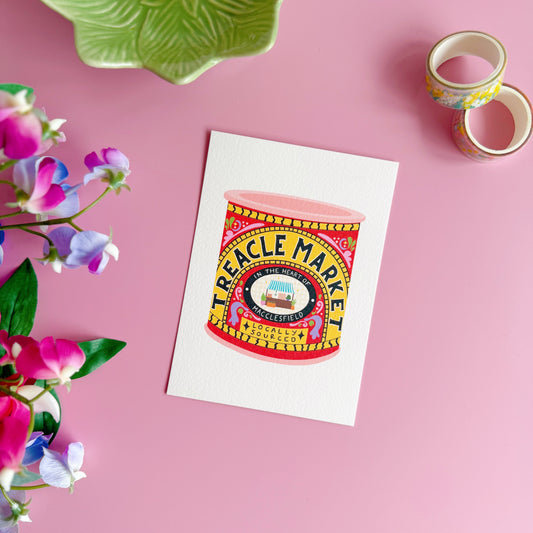 Colourful Treacle Market illustration on a white card with flowers and tape on a pink background