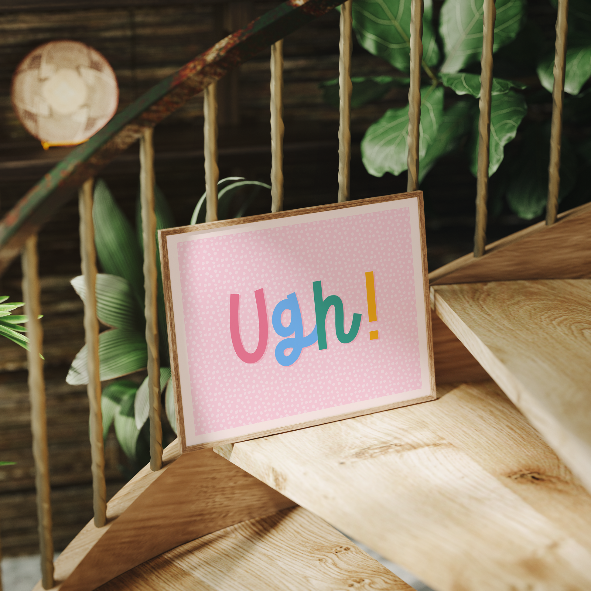 A pink patterned print, with the word 'Ugh!' in a hand drawn script font in the centre.