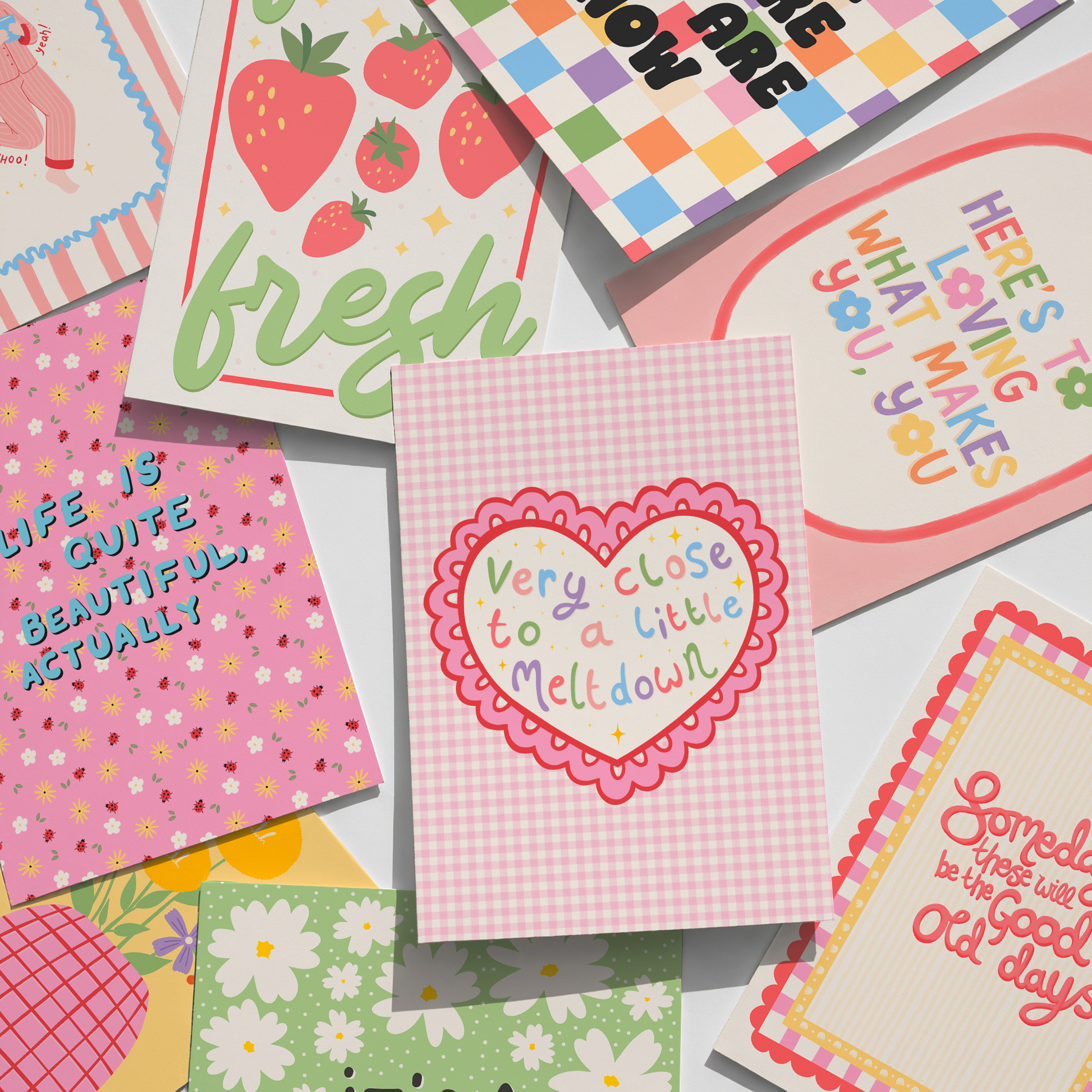 Collection of colourful prints with various designs and text.