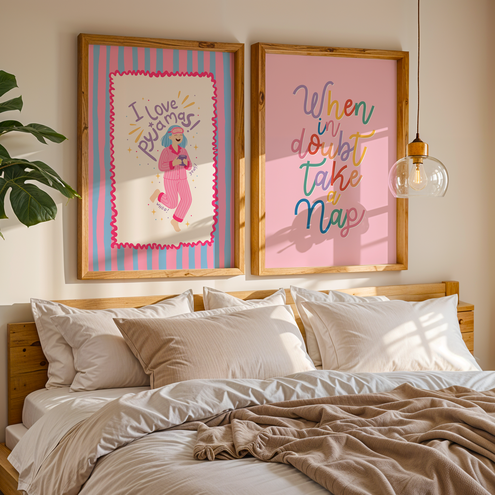 Bedroom with two framed pictures on the wall above a bed.