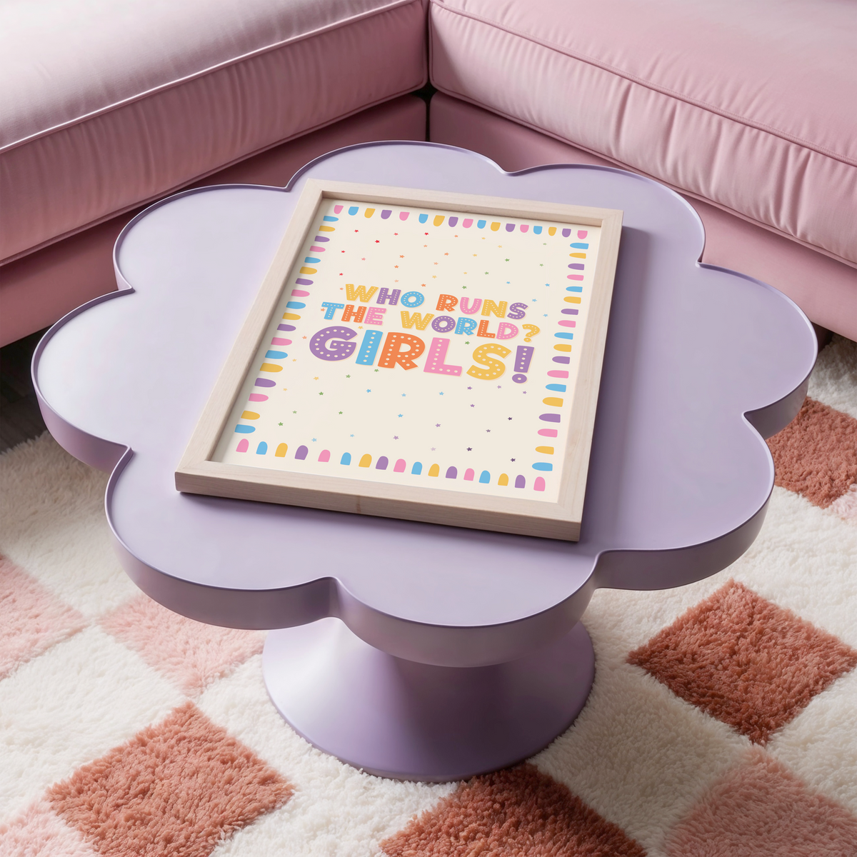 A nursery print with a colourful quote that reads 'who runs the world? GIRLS!' with a bright pastel coloured brush stroke border.
