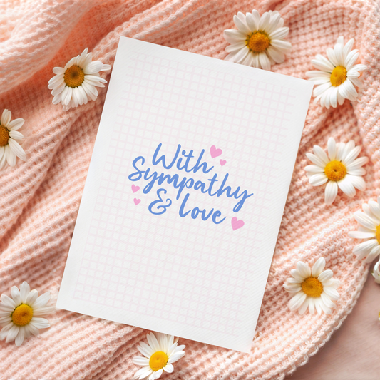 A simple card, with the words with sympathy and love in a blue script font surrounded by small pink hearts.