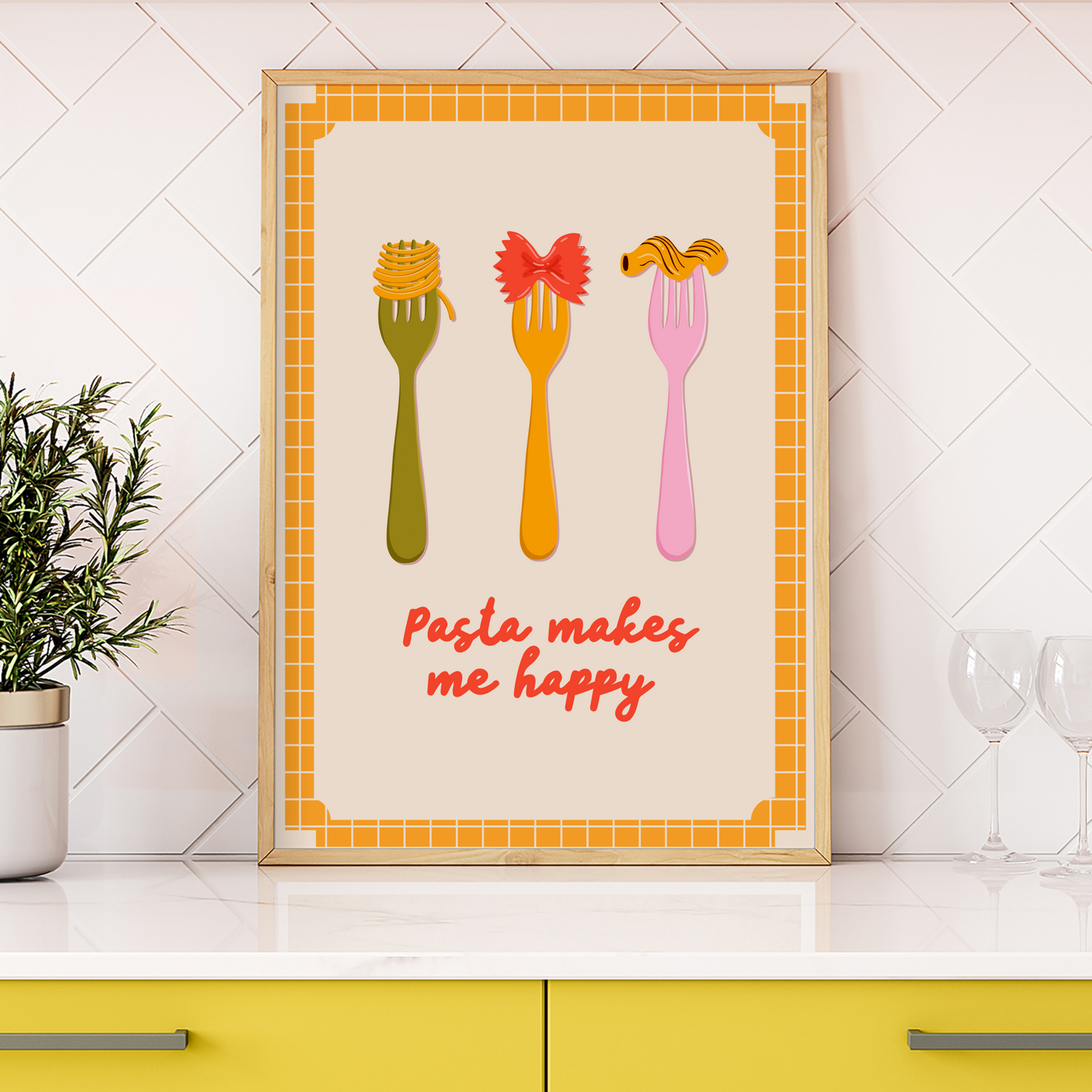 A pasta lovers print, with different shapes pasta on forks, and the words pasta makes me happy underneath. The print is framed by a yellow checked border.