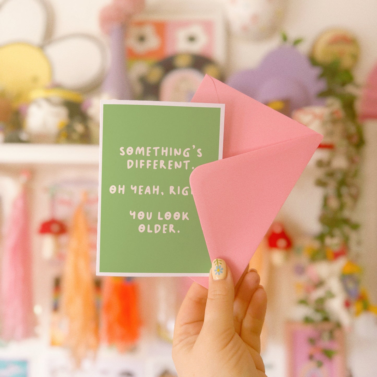 A simple birthday card, with a funny sarcastic message on the front which reads 'Something's different. Oh yeah, right. You look older.'