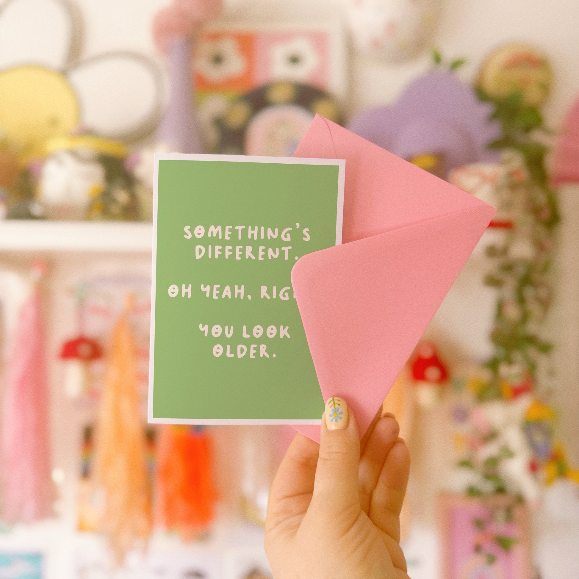 A simple birthday card, with a funny sarcastic message on the front which reads 'Something's different. Oh yeah, right. You look older.'