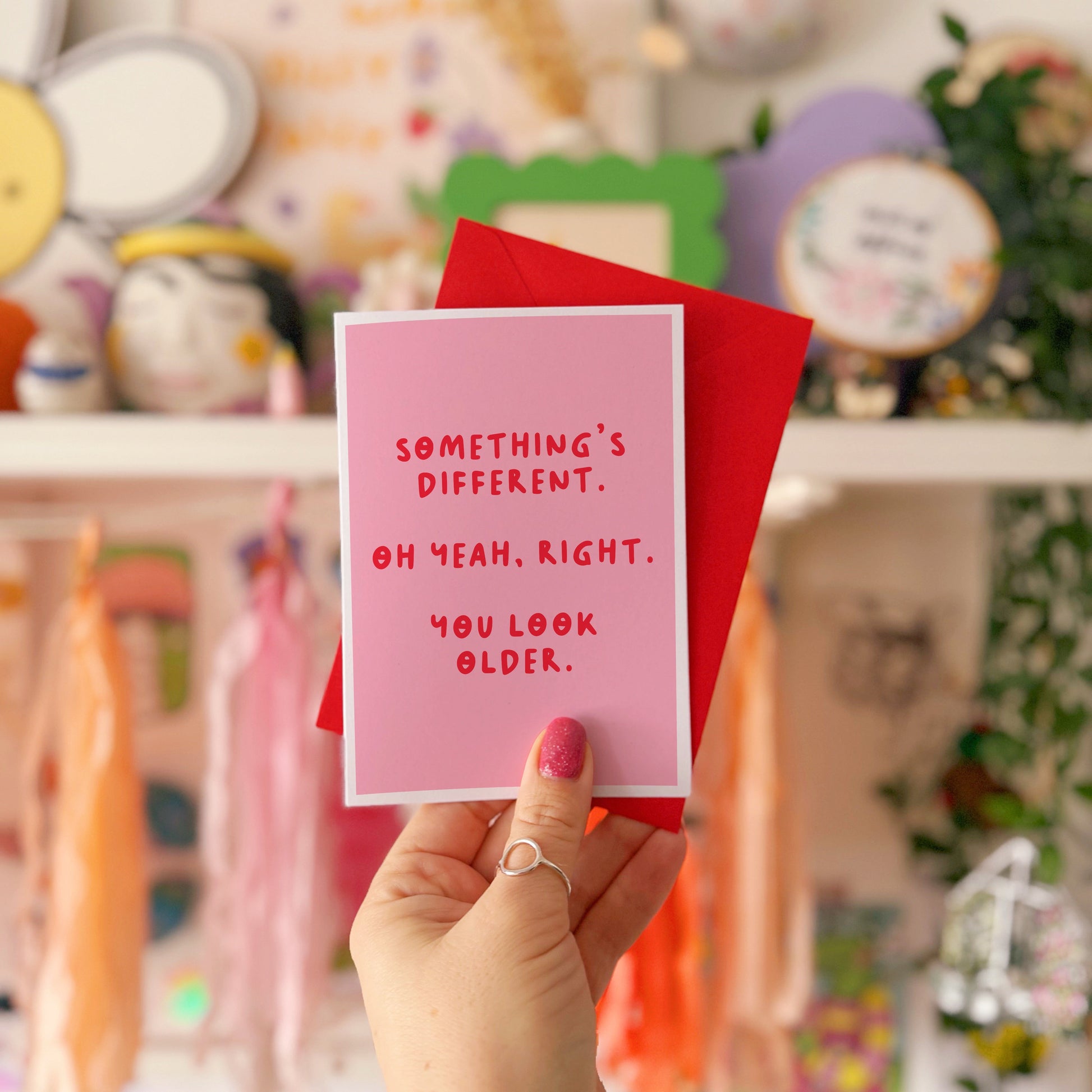A simple birthday card, with a funny sarcastic message on the front which reads 'Something's different. Oh yeah, right. You look older.'