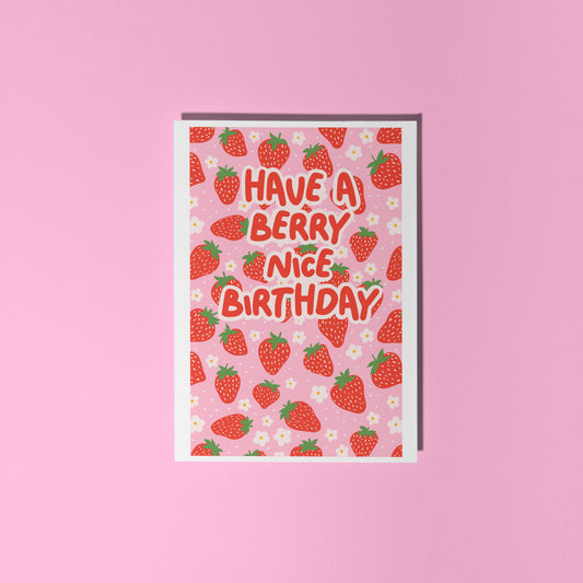 A pink and red card, with a strawberry pattern, and text saying 'have a berry nice birthday'.