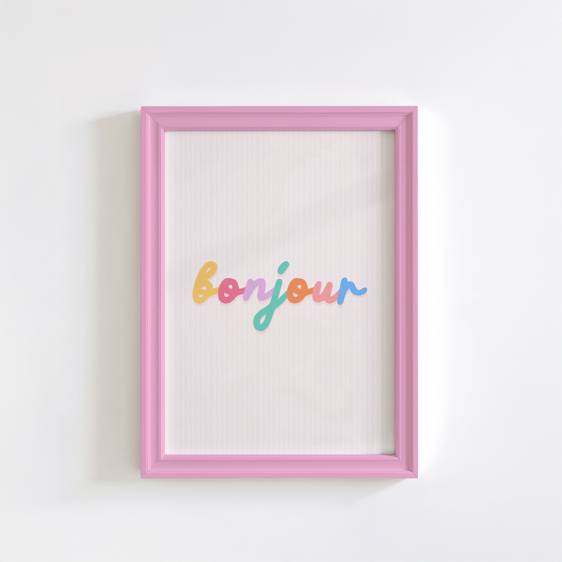 A pale pink striped background with the word 'Bonjour' in the centre, in multi colours. 