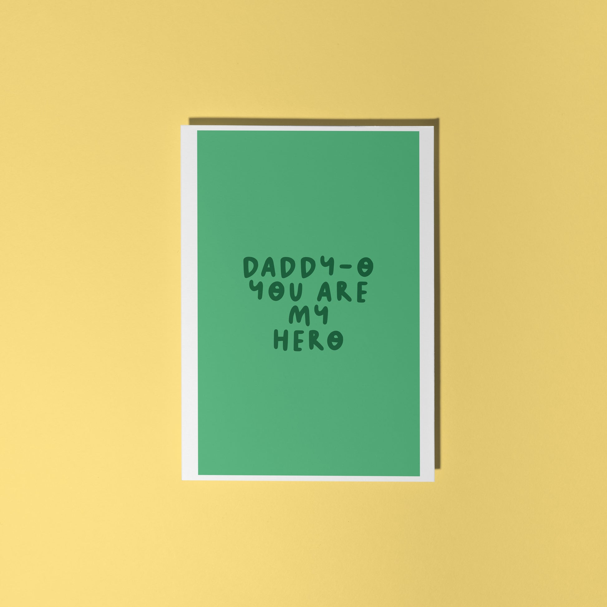 A green fathers day card, with text that reads 'Daddy-o you are my hero'.