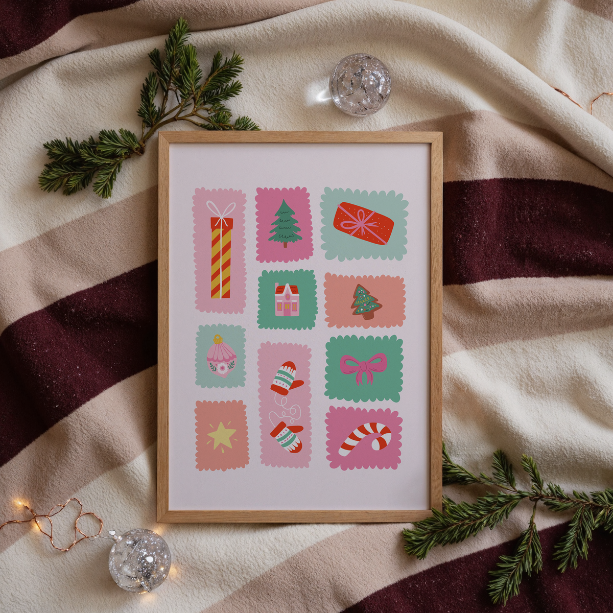 An illustrated Christmas print featuring small scalloped edged stamp-like shapes each with their own festive themed doodle inside.