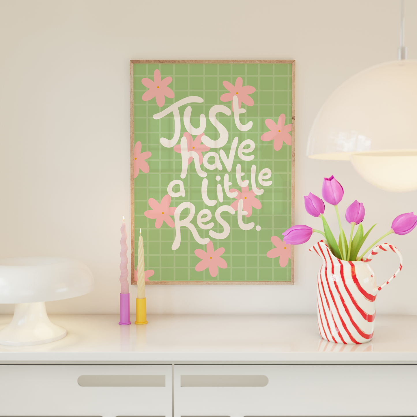 A green print with a positive quote that says 'just have a little rest' in off-white text. 