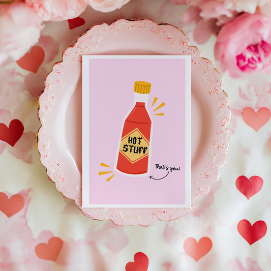 A funny card with a bottle of hot sauce, saying 'Hot Stuff' on it. 