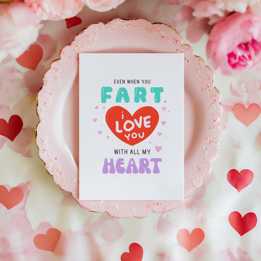 A funny love card, saying even when you fart I love you with all my heart.