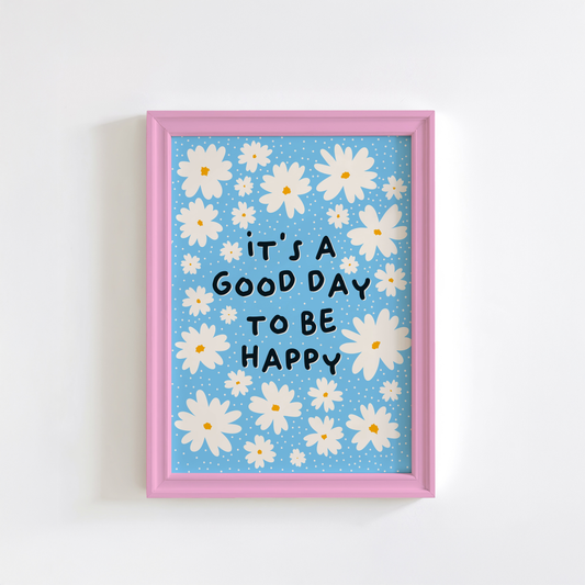 A bright blue print, with white daisy illustrations surrounding a happy quote saying it's a good day to be happy.