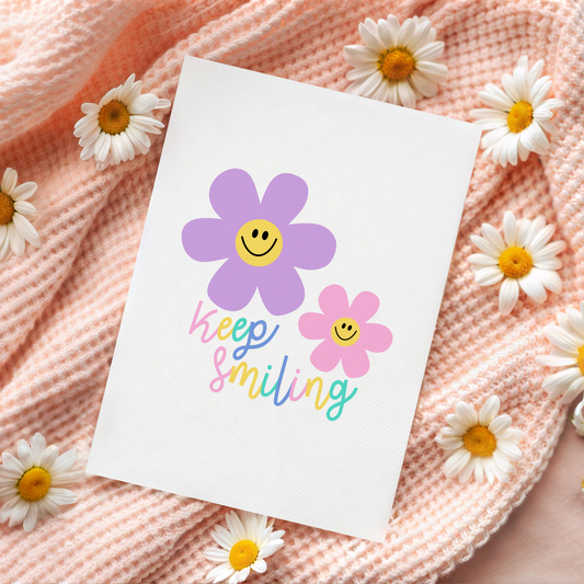 A card with floral illustrations and text that says you are bloomin' lovely