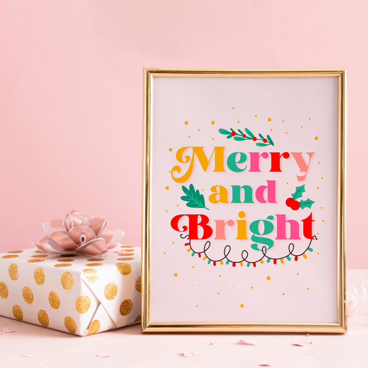 A festive quote print featuring the words 'merry and bright' in lots of bright seasonal colours, surrounded by little festive doodles of Christmas lights and holly.