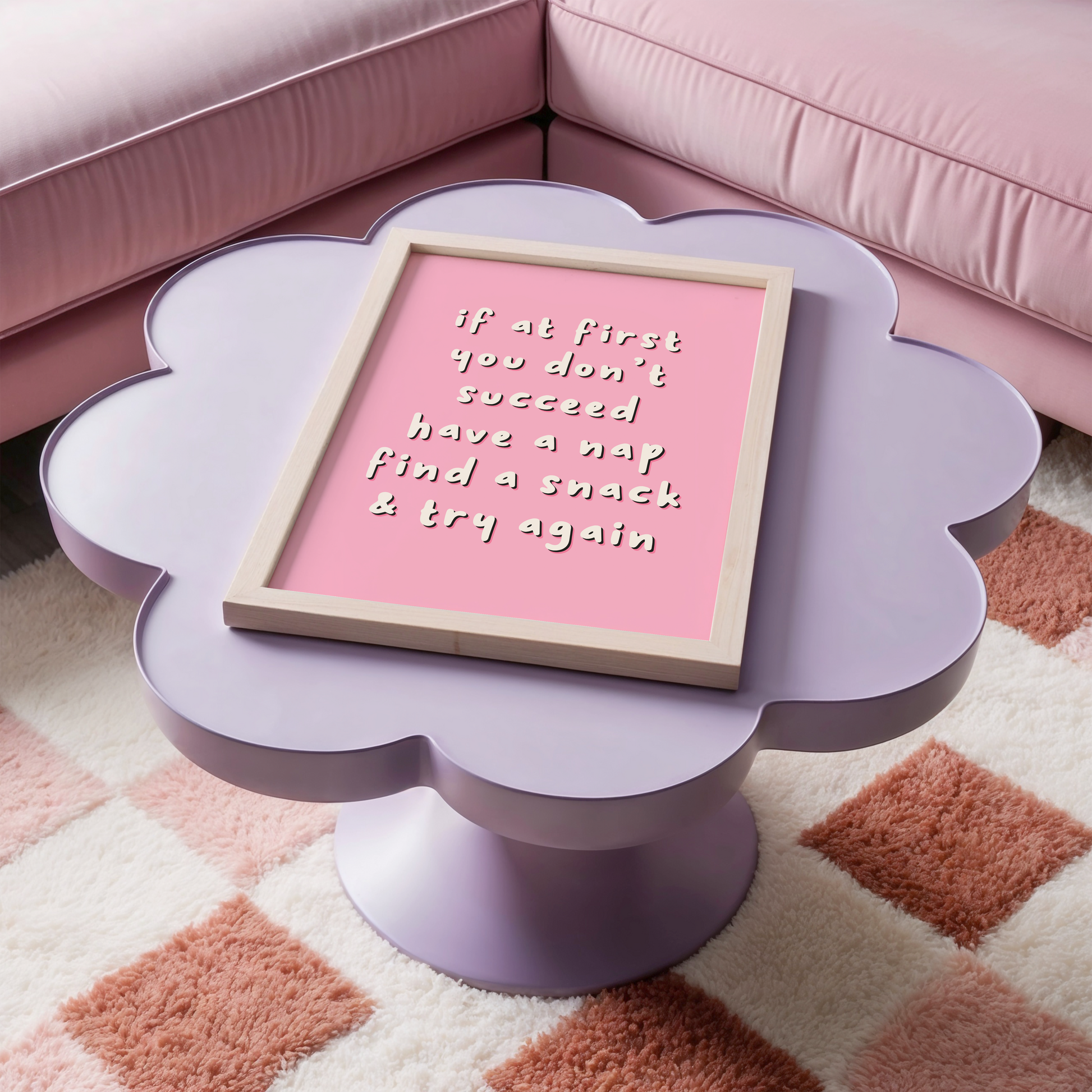 Framed pink poster with a funny lighthearted quote on a white background