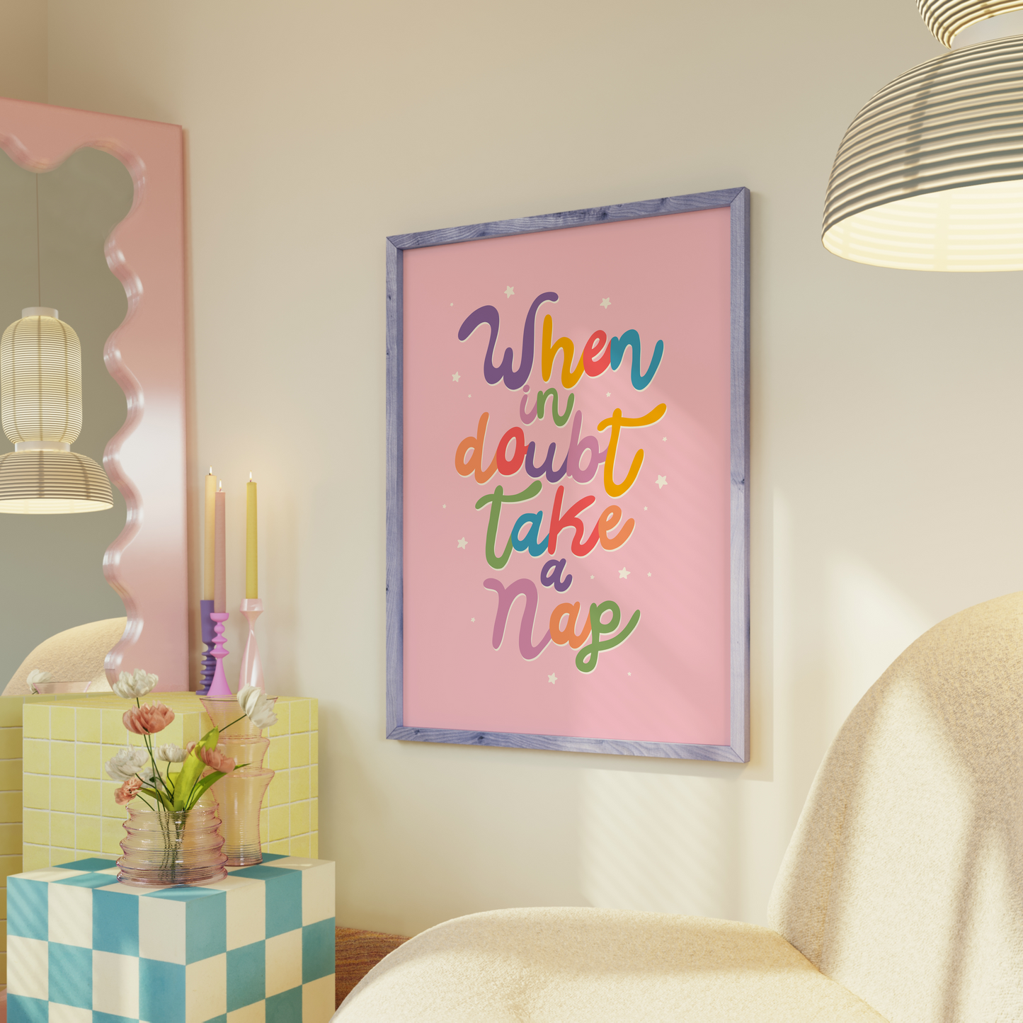 A pink print with a quote in colourful hand drawn lettering, that reads 'when in doubt, take a nap'.