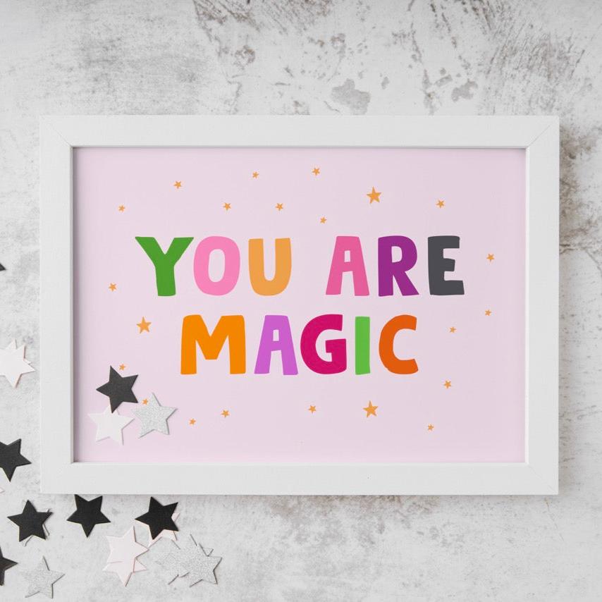 A colourful quote print that reads 'YOU ARE MAGIC' in bright and bold Halloween themed colours.