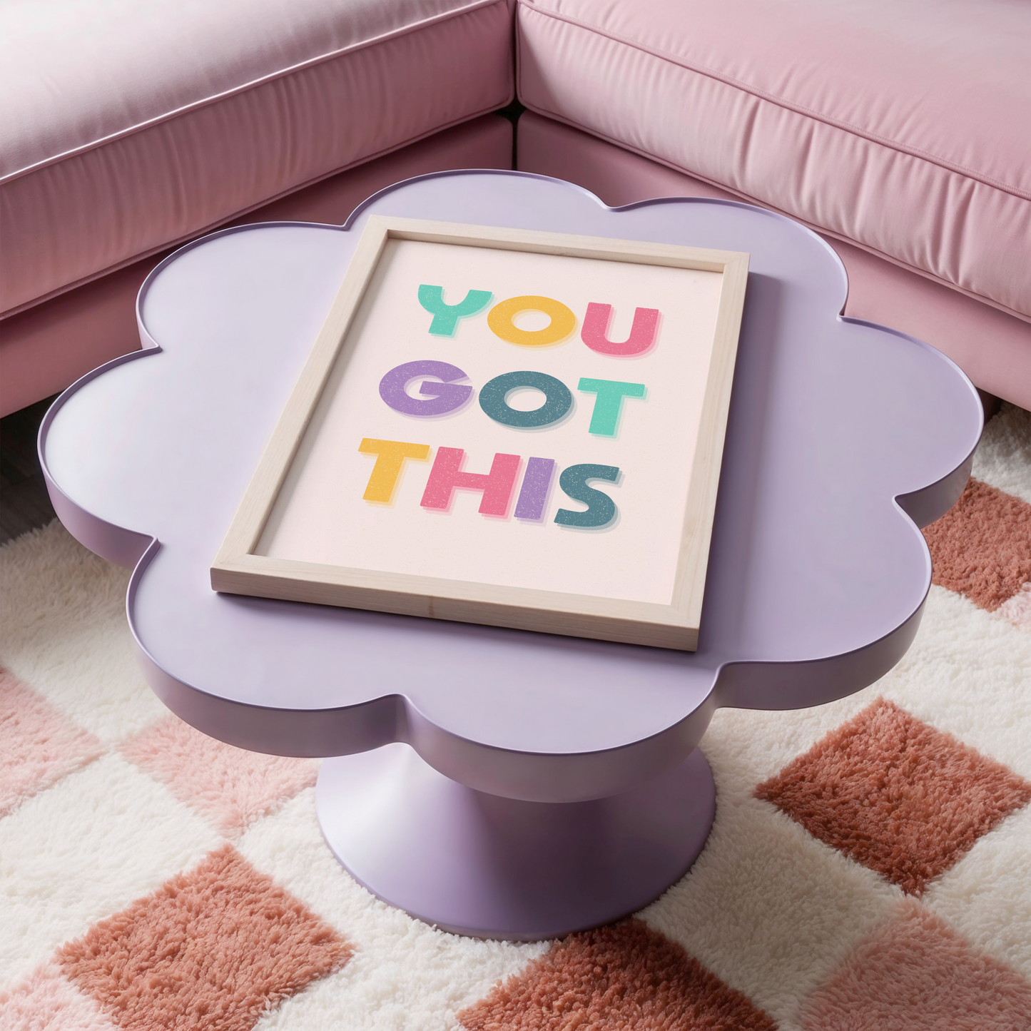 A motivational print with multicoloured lettering, saying You Got This.