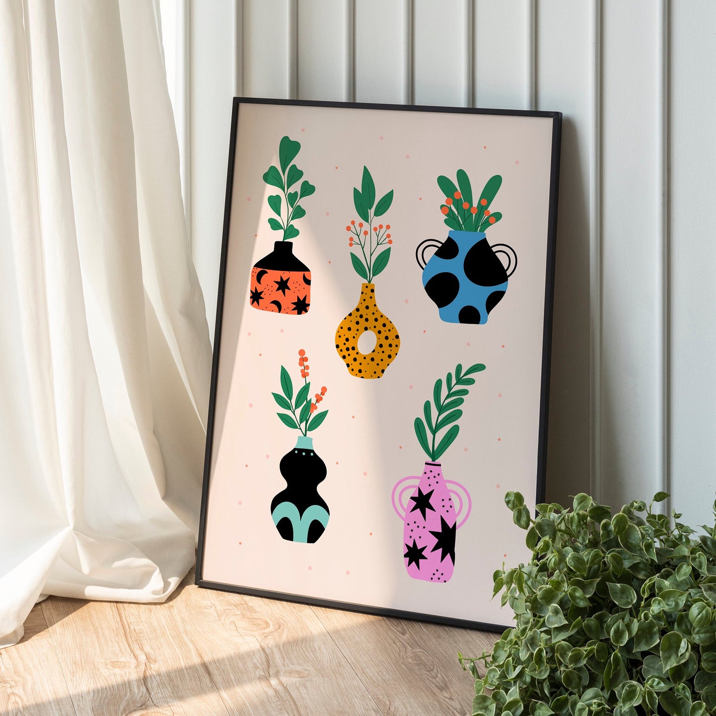 A collection of 5 vase illustrations, in colours of orange, blue, teal, pink and yellow. All the vases have patterns on and greenery in them.